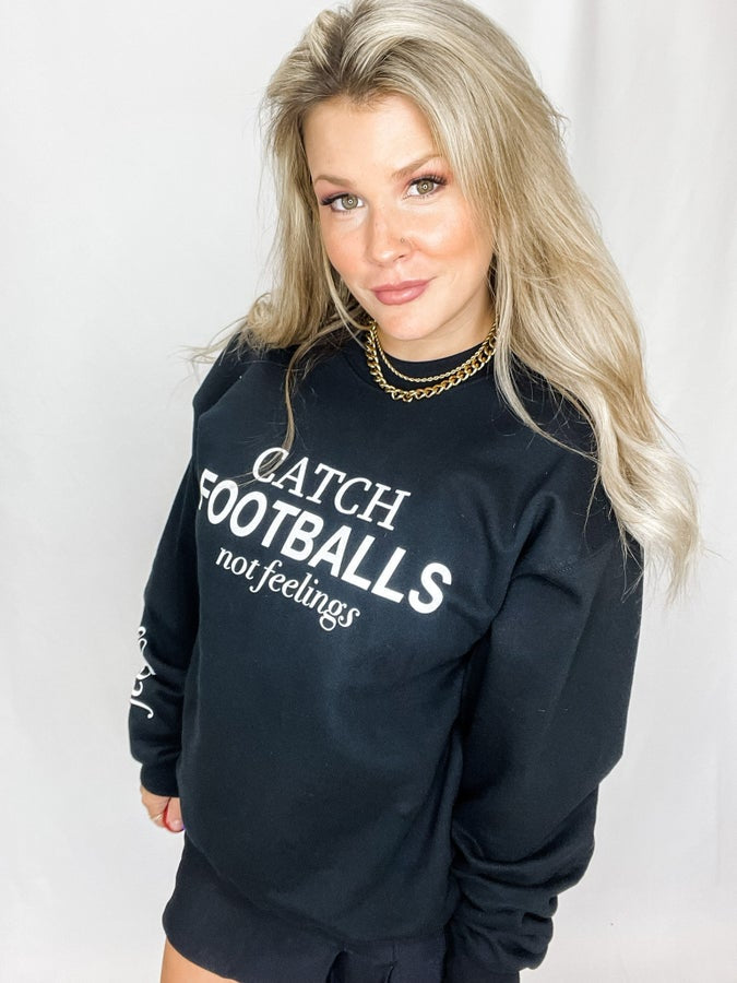 Catch Footballs Not Feelings Sweatshirt