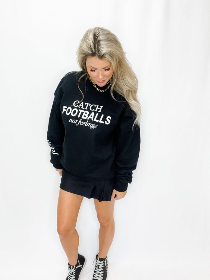 Catch Footballs Not Feelings Sweatshirt